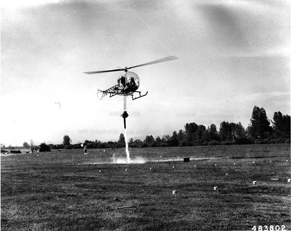 early helicopter fire fighting bucket trials in 1957 Bell 47