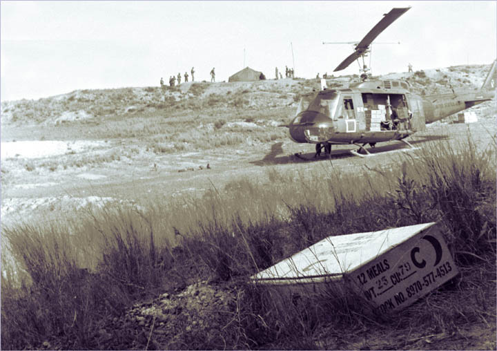 A forward base somewhere in the middle of no where. We've just dropped off a load of everyone's favorite treat, good old C-rations. Photo Credit: R.Mason