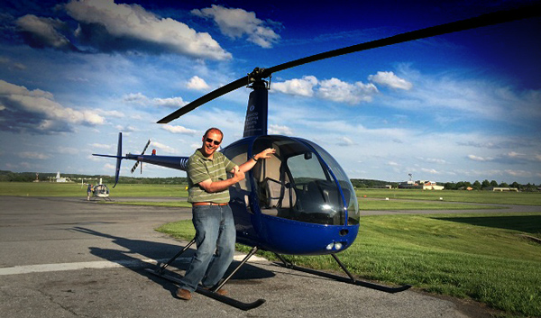 Ian Twombly converted across to helicopters in 2014 and this is a photo after completing his checkride.