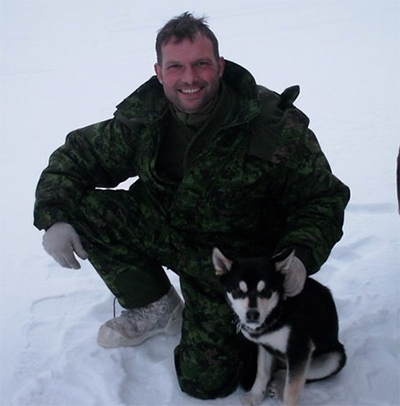John training in the snow with UK military