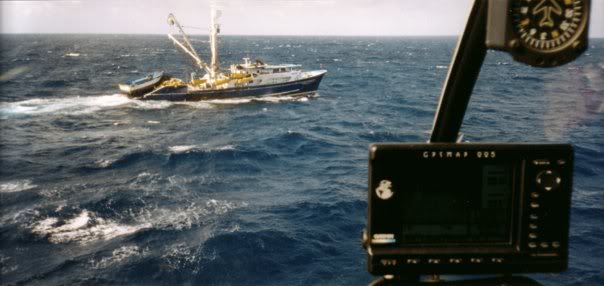 A typical tuna fishing boat - the only dry landing spot within fuel endurance.