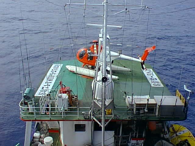 The helideck is usually located on top of the vessel bridge and in front of the lookout and radio masts.