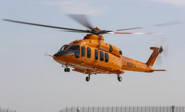 Bell 525 Flight Test Vehicle 1 - hard to see in this smaller image but the signatures of the customer advisory group have been painted on the tailboom. Photo Credit: Bell Helicopter