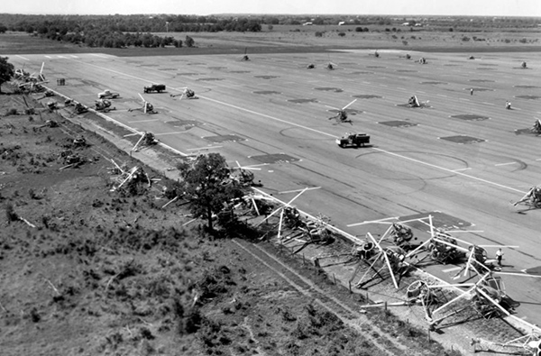 On 4/13/67 a heavy wind storm, possibly a tornado, struck the Downing Heliport damaging 179 TH-55A helicopters.
